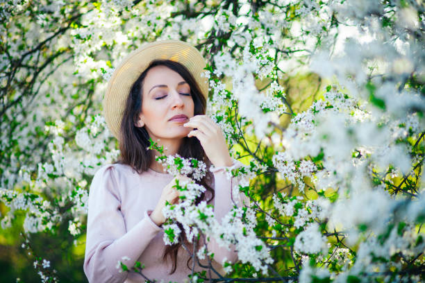 istock Beautiful girl with flowers 1137845509