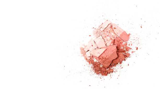Texture background of broken powder blush isolated on white background. Horizontal. Flat lay. Copy space,