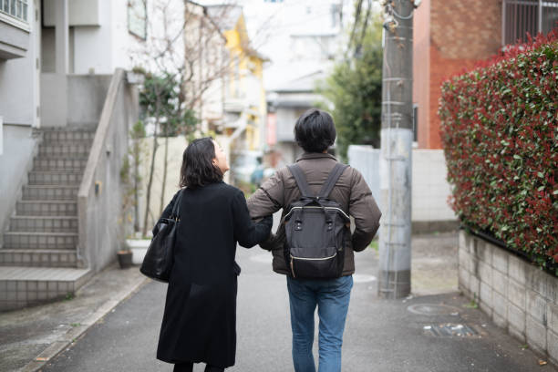 istock Couple walking on street 1137851525