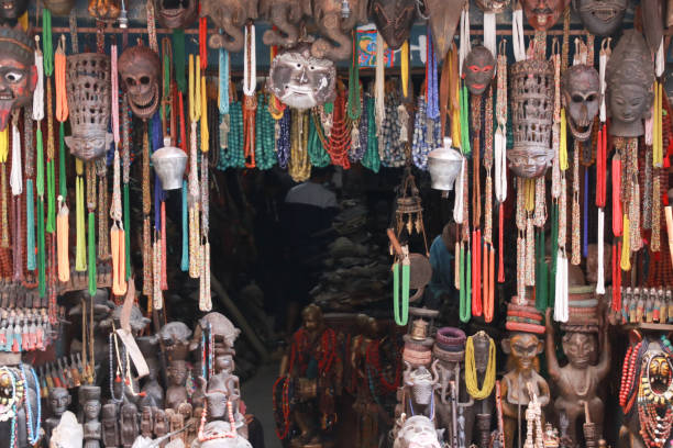 Thamel Kathmandu city, Nepal.Colorful Tradition wooden masks and handicrafts on sale at shop in the Thamel District of Kathmandu, Nepal Thamel Kathmandu city, Nepal.Colorful Tradition wooden masks and handicrafts on sale at shop in the Thamel District of Kathmandu, Nepal thamel stock pictures, royalty-free photos & images