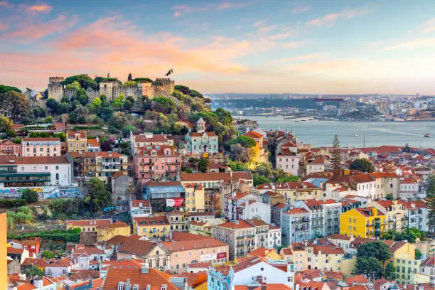 Lisbon, Portugal skyline at Sao Jorge Castle at sunset.