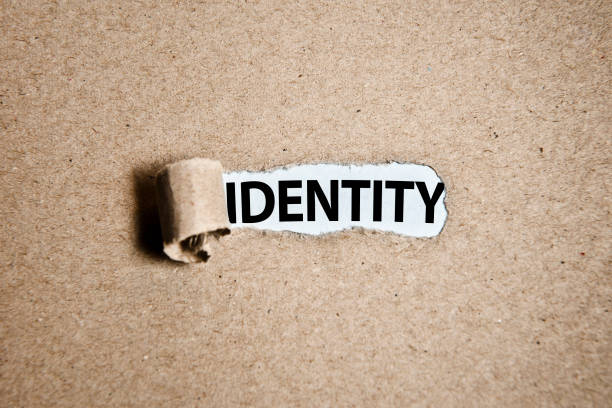 IDENTITY / Torn cardboard paper (Click for more) stock photo