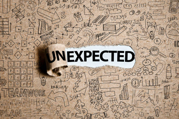 UN-EXPECTED / Torn cardboard paper (Click for more) stock photo
