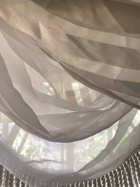 istock Close up Ivory White Sheer Fabric Drapery 1137868264