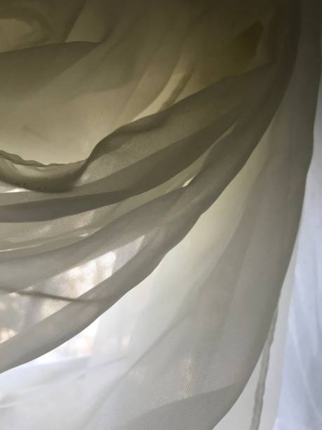 istock Close up Ivory White Sheer Fabric Drapery 1137868270