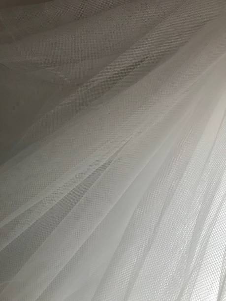 istock Close up Ivory White Sheer Fabric Drapery 1137868273