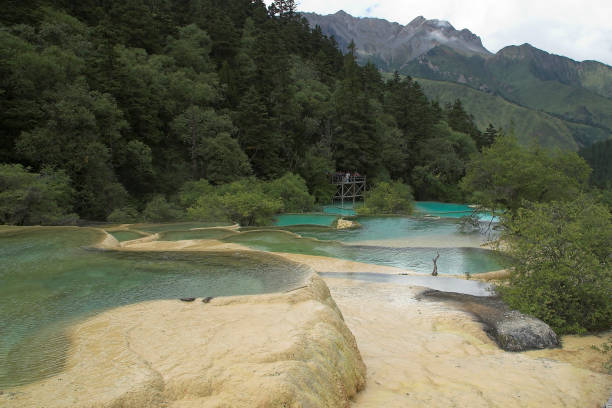 View down the valley with colorful ponds