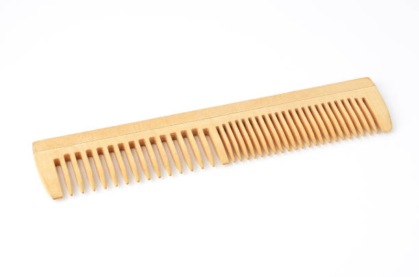 istock Wooden rake-comb on white 1137871211