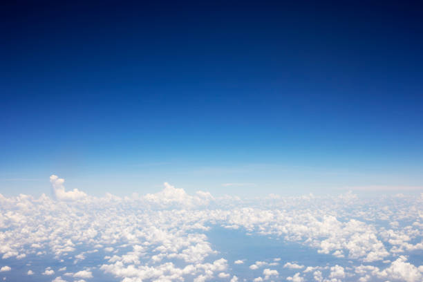 istock Blue sky background and white clouds soft focus, top view take a picture on airplane. 1137889455
