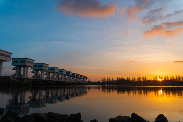 istock View of waterproof dam with sunset sky beautiful background. 1137890171