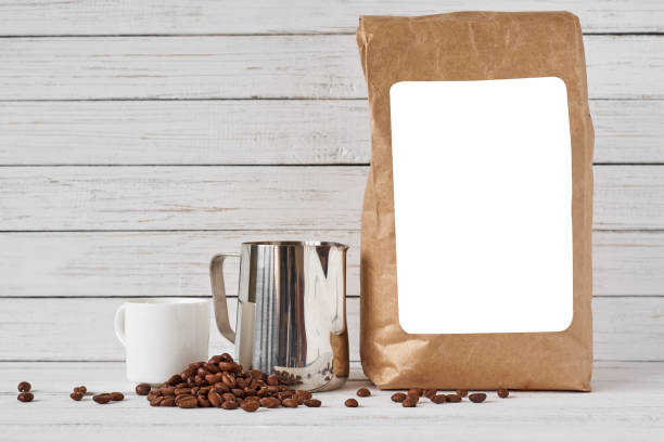 istock Coffee cup, craft paper bag and stainless pitcher 1137891436