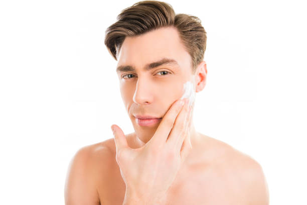 istock Handsome young man with shaving cream on his cheek 1137893184