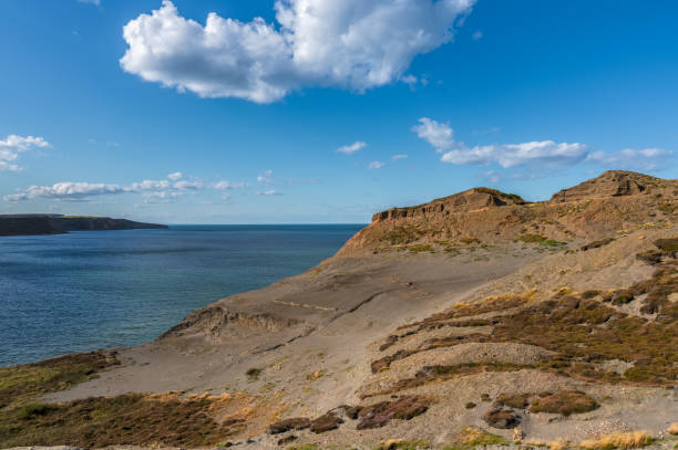 istock Clouds over the quarry in Kettleness, England, UK 1137894122