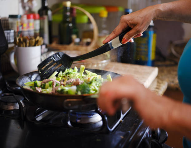 istock cooking beef and broccoli stir-fry in hot pain inside home kitchen 1137895314