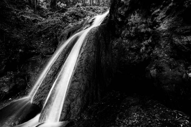istock Waterfall in the woods in Pale (Umbria, Italy) 1137901564