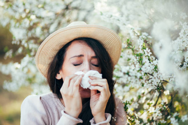 It's the season of sneezes One Woman Only, Women, Adult, 20-29 Years, Adults Only Pollen Allergy stock pictures, royalty-free photos & images