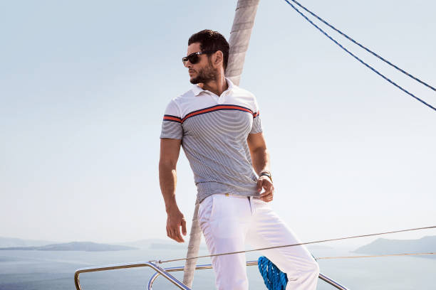 istock Sailing man on yacht in ocean 1137914866