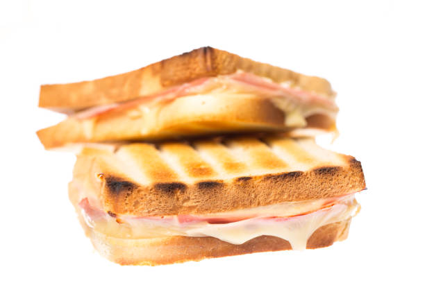 istock Two ham cheese toasts on each other on white background 1137915206