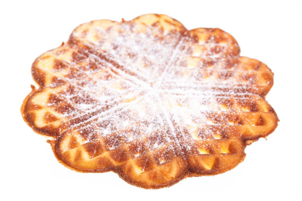 Single waffle with sugar topping isolated on white background