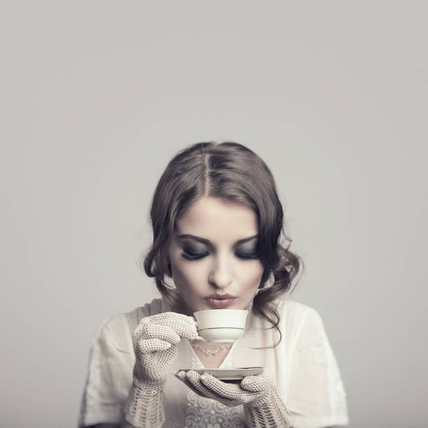 istock Retro woman drinking coffee 1137915982