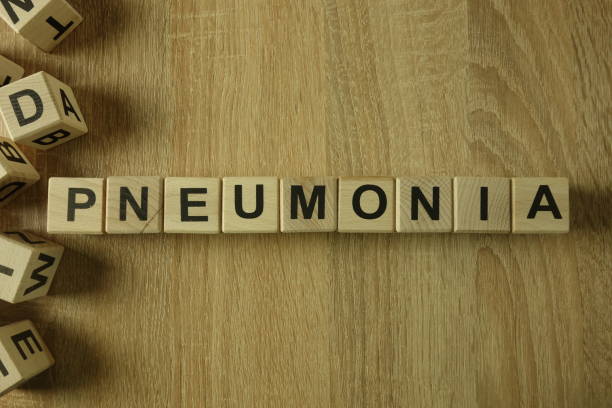 istock Pneumonia word from wooden blocks 1137916120
