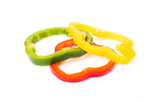 istock Slices of bell pepper isolated on white background. 1137917837