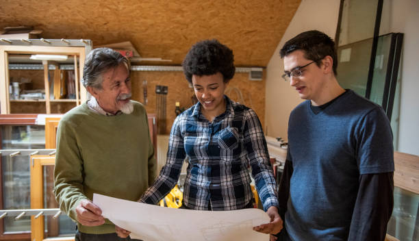 istock Team of carpenters working on new project 1137919724