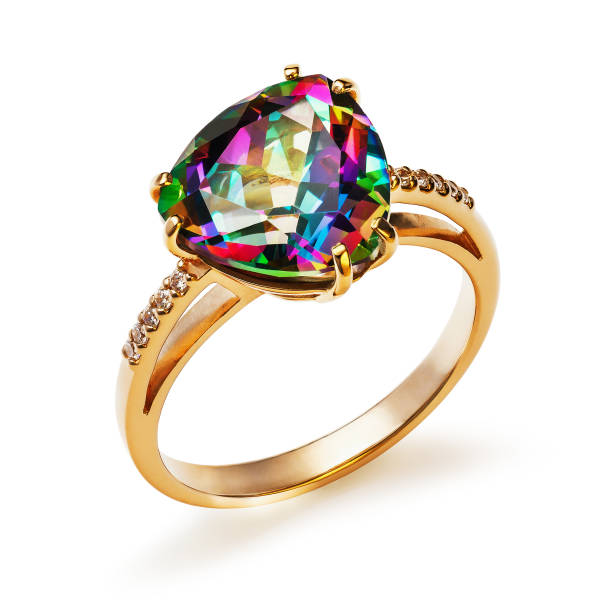 istock Golden ring with iridescent stone isolated on white background 1137919986