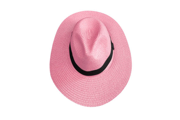 istock Top view pink pretty straw hat isolated on white background 1137920328