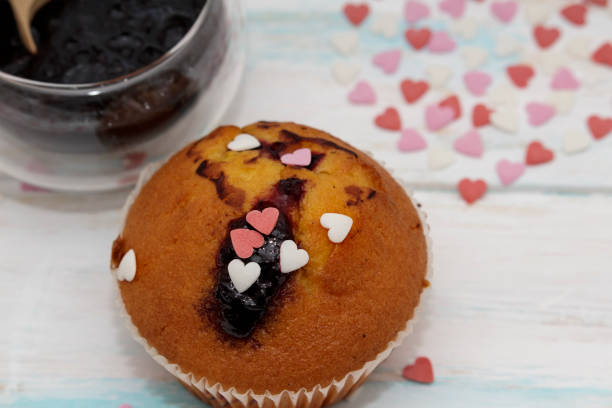 istock Blueberries muffins or cupcakes on white texture 1137920365