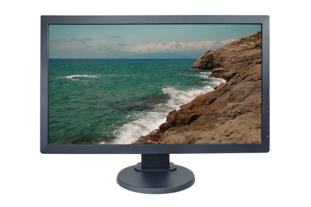 istock Computer monitor isolated on white with screensaver running 1137921117
