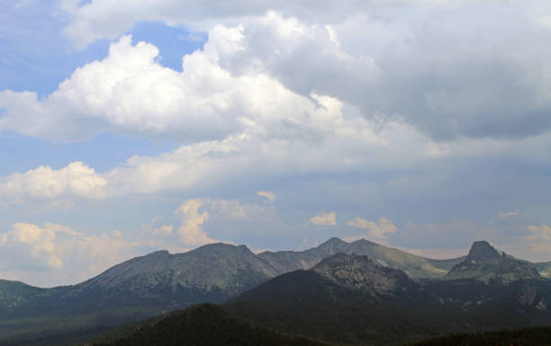 istock beautiful scenic clouds on mountain landscape Sayany 1137922436