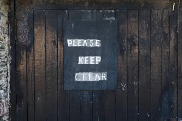 Please keep clear chalk on black board uk