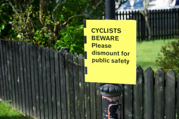istock Cyclists beware dismount for public safety lane 1137924512