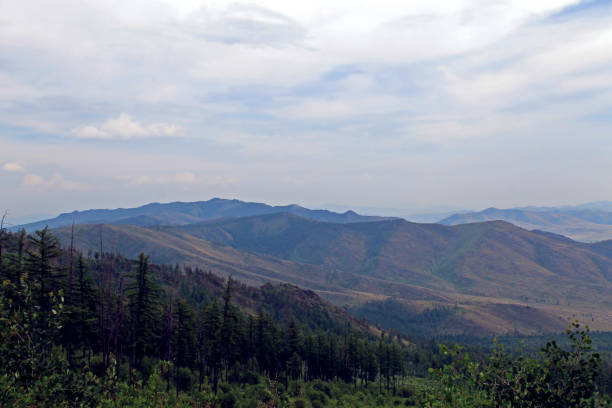 istock beautiful scenic clouds on mountain landscape Sayany 1137925818