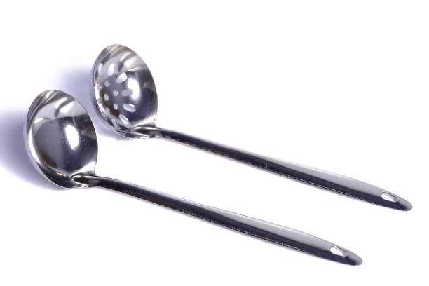 istock Perforated spoon and LADLE  on a white background 1137926551