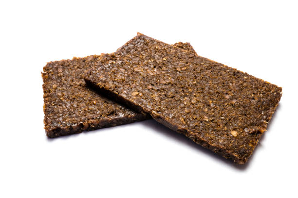istock Pumpernickel bread isolated on white background 1137926575