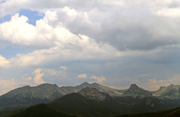 istock beautiful scenic clouds on mountain landscape Sayany 1137927068