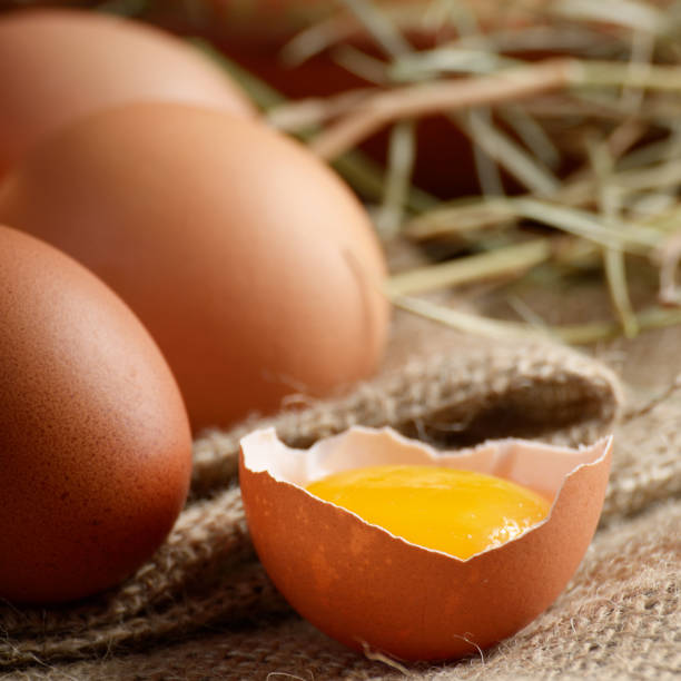 istock Fresh brown organic chicken eggs on wooden table and hemp burlap 1137929644