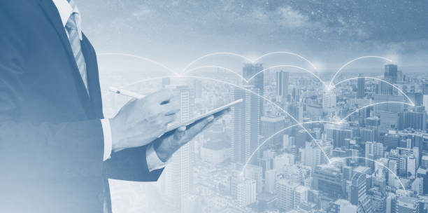 istock Business network, blockchain technology and internet connection. Businessman working on digital tablet, and city networking 1137931185