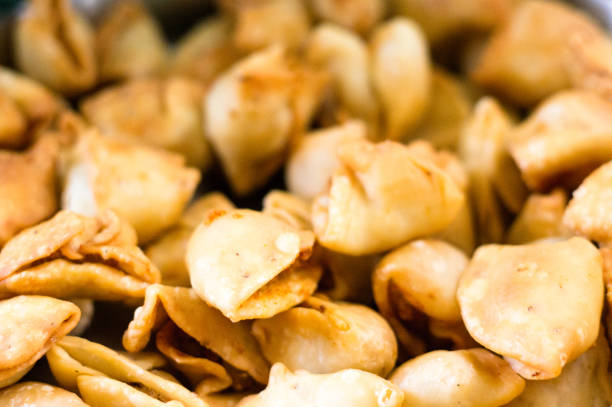 istock Closeup shot of small samosa, fried hot pocket type snacks 1137931266