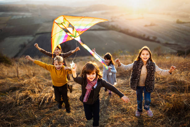 istock Playing with kite in autumn day! 1137932302