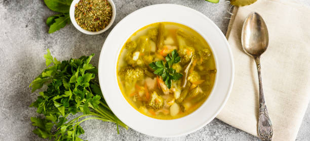 istock Tasty vegetables and spices soup on a gray concrete background 1137932483
