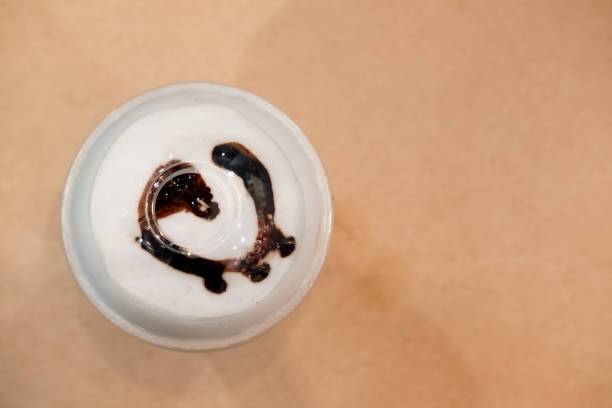 istock Ice drink with foam milk and chocolate sauce 1137934166