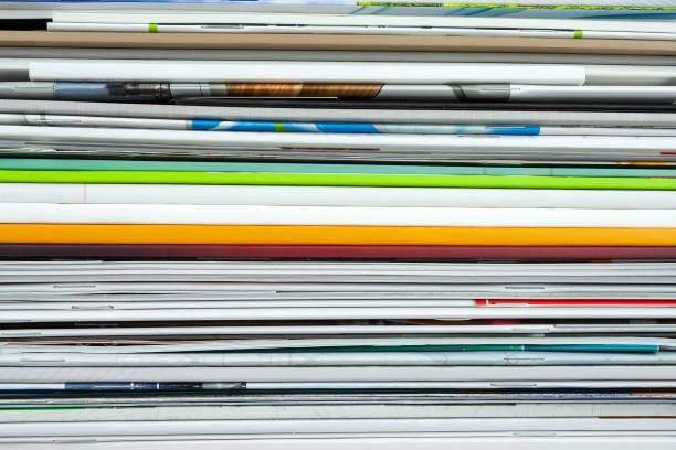istock Background from stacked magazines, brochures, notebooks, catalogs 1137936564