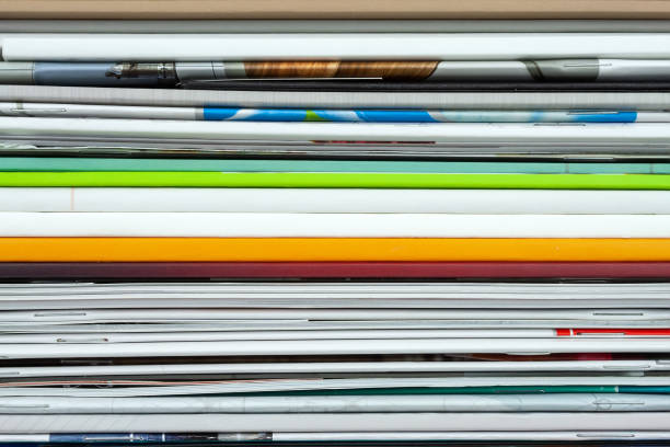 istock Background from stacked magazines, brochures, notebooks, catalogs 1137936596