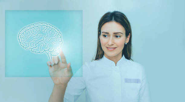 istock Woman scientist touching medical interface with brain 1137937271