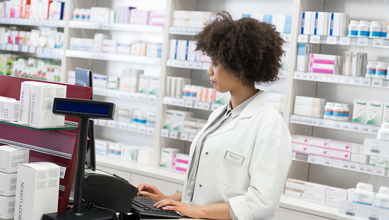 Young Woman Pharmacy Business Owner