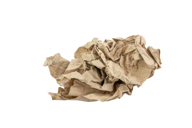 istock brown crumpled paper isolated on white background 1137941044