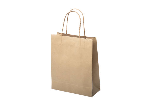 istock Brown paper shopping bag isolated on white background 1137943853